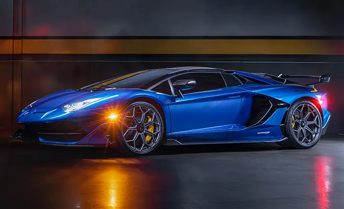 Blue Lamborghini Aventador SVJ Roadster.